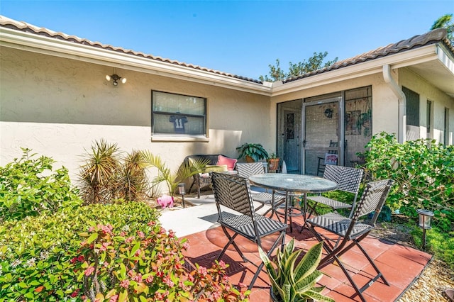 view of patio featuring outdoor dining space