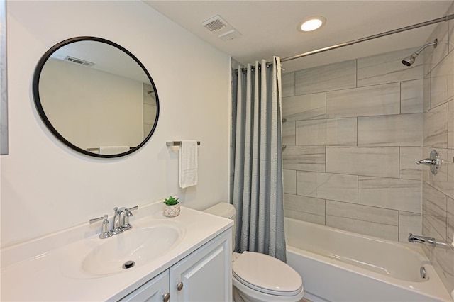 bathroom with visible vents, shower / bath combination with curtain, toilet, and vanity