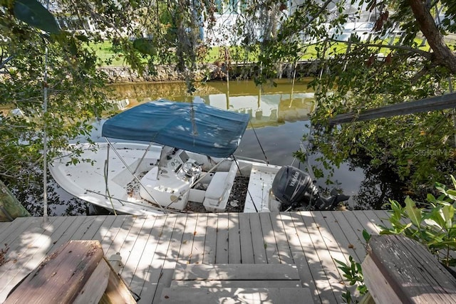 view of dock with a water view