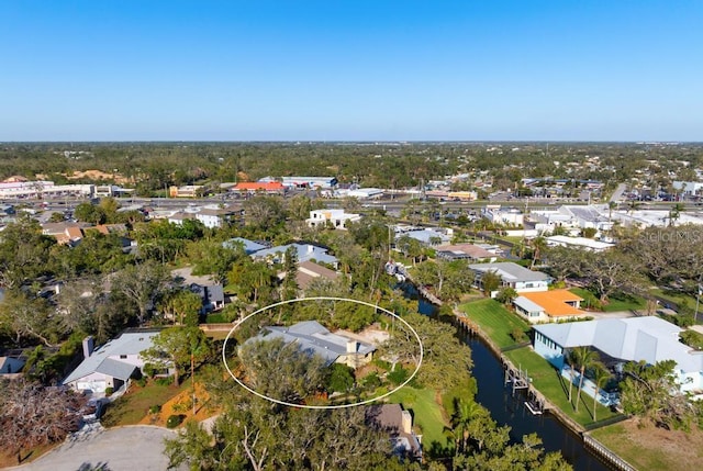 bird's eye view with a residential view and a water view