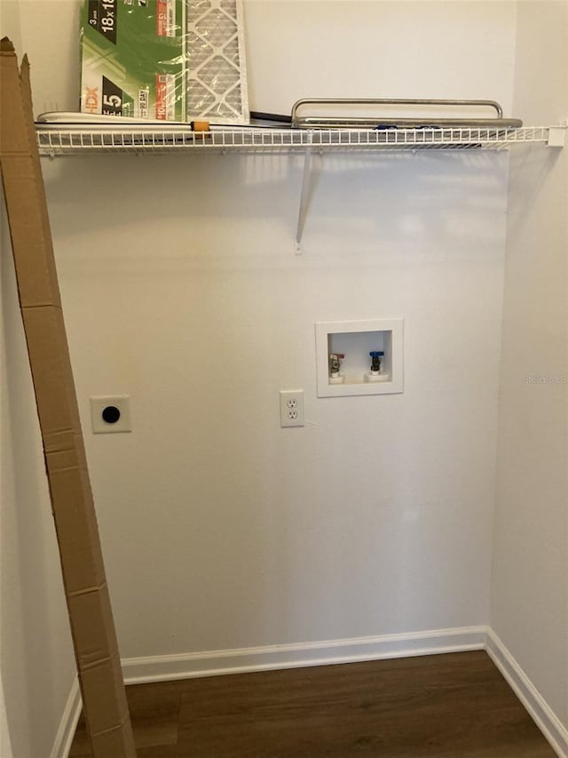 laundry room with baseboards, laundry area, hookup for a washing machine, dark wood-style floors, and hookup for an electric dryer