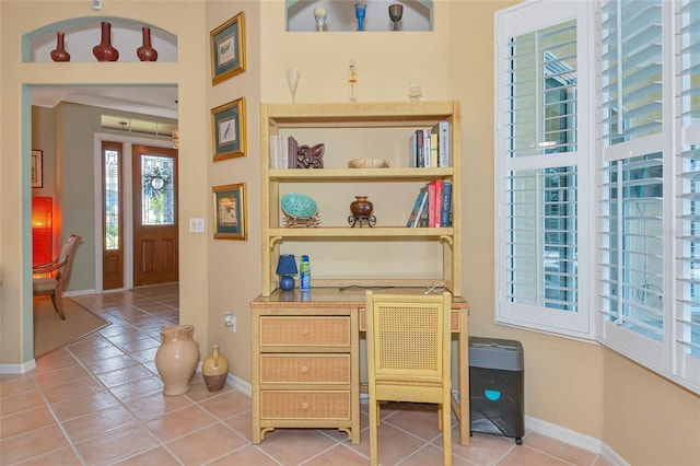 office featuring light tile patterned floors and baseboards