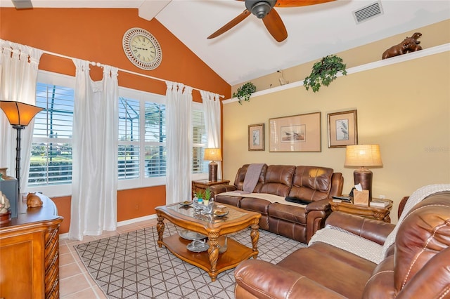 living room with light tile patterned flooring, visible vents, lofted ceiling with beams, and ceiling fan