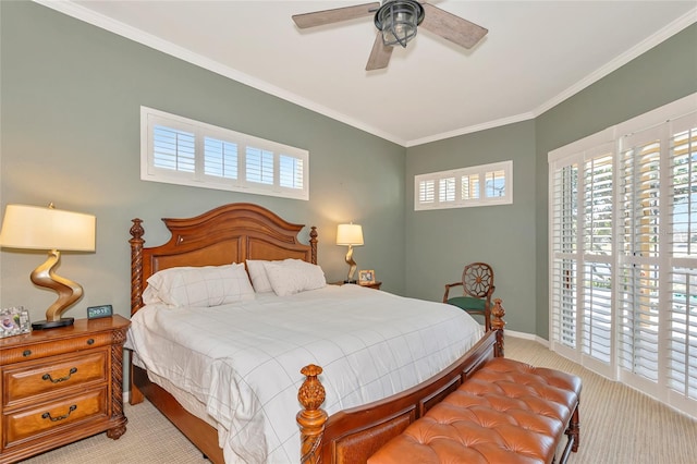 bedroom with a ceiling fan, crown molding, and baseboards