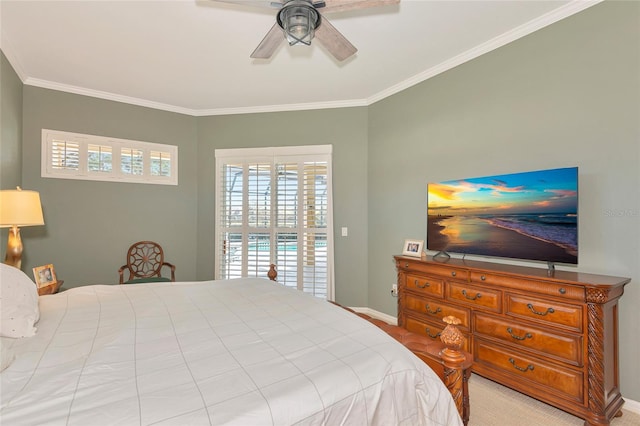 bedroom with baseboards, ceiling fan, and crown molding