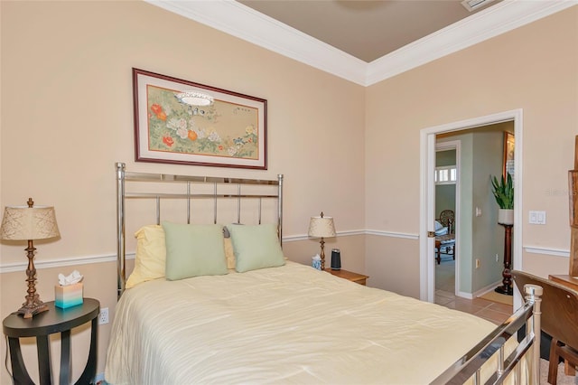 tiled bedroom with baseboards and ornamental molding