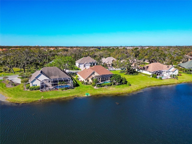 bird's eye view with a residential view and a water view