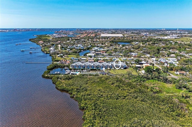 aerial view featuring a water view and a residential view