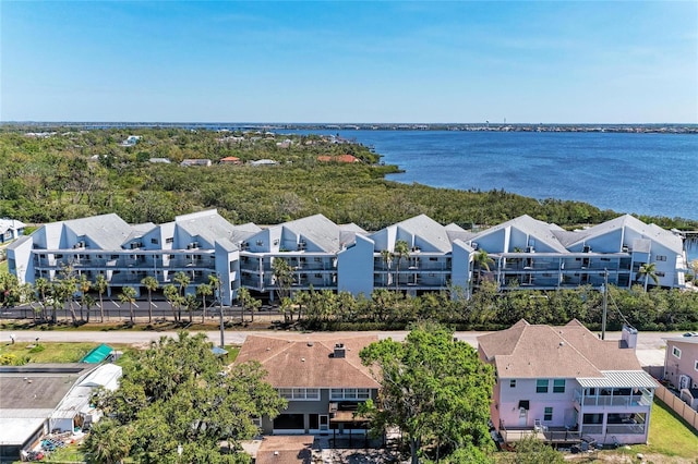 birds eye view of property featuring a residential view and a water view