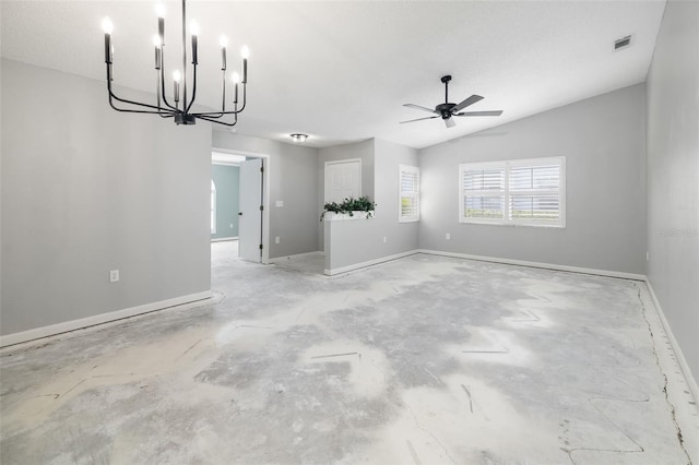 spare room with visible vents, concrete floors, baseboards, vaulted ceiling, and a ceiling fan