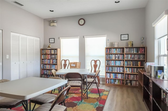 office featuring visible vents and wood finished floors