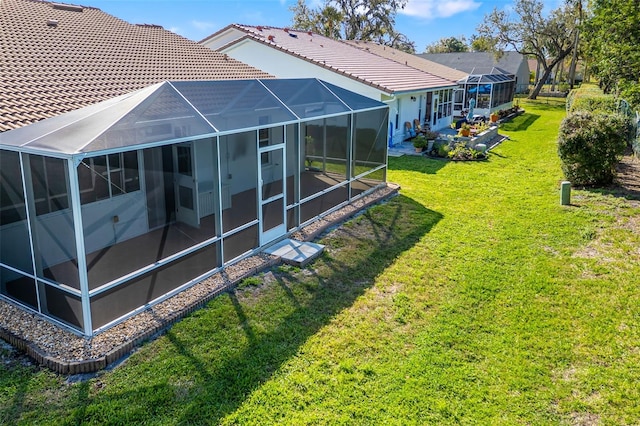 view of yard with a lanai