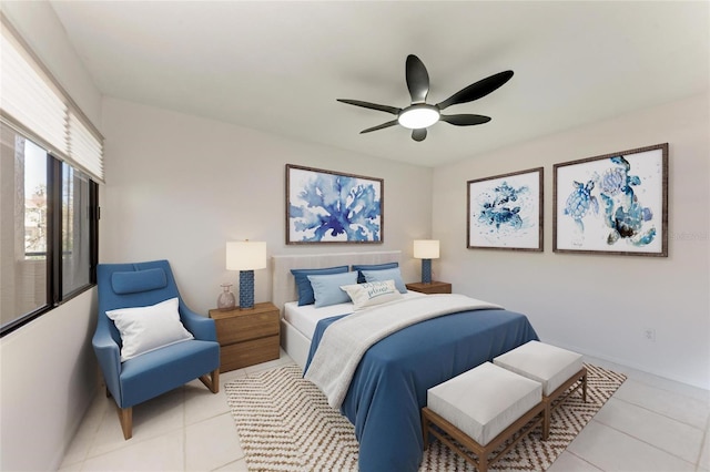 bedroom featuring light tile patterned flooring and a ceiling fan