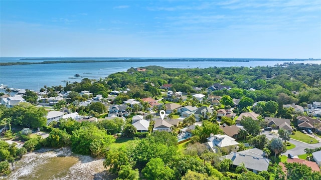 birds eye view of property with a residential view and a water view