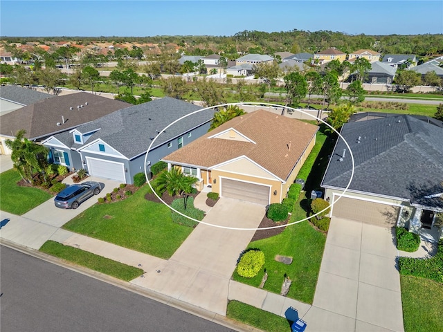 drone / aerial view with a residential view