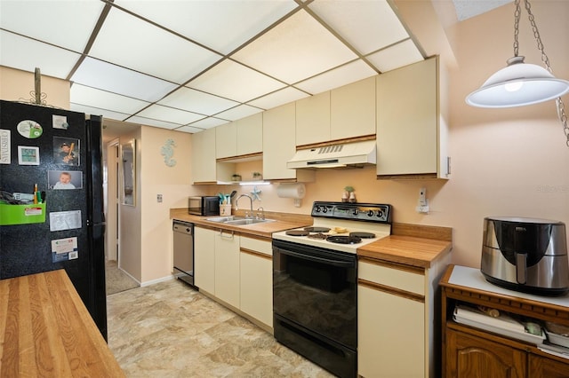 kitchen featuring black appliances, under cabinet range hood, wood counters, a sink, and cream cabinets