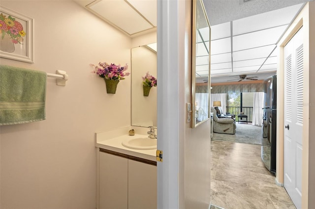 bathroom with vanity and ceiling fan