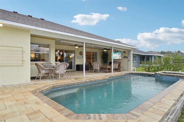 3419 31st St E, Bradenton, FL 34208 - view of swimming pool with a ceiling fan, a patio, outdoor dining area, and a pool with connected hot tub