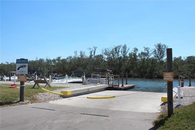 view of dock with a water view