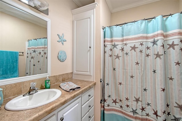 bathroom featuring vanity and crown molding