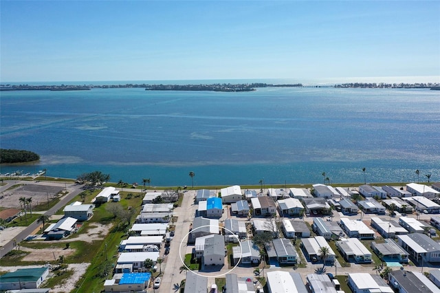 aerial view with a water view and a residential view