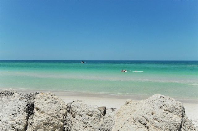 property view of water featuring a beach view