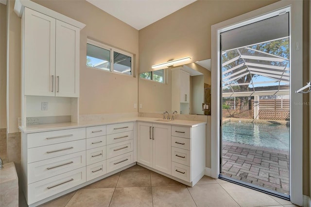 bathroom featuring tile patterned floors and vanity