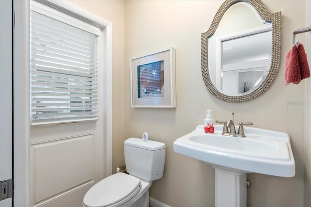 bathroom with a sink and toilet