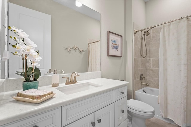 full bathroom with vanity, shower / bath combination with curtain, and toilet