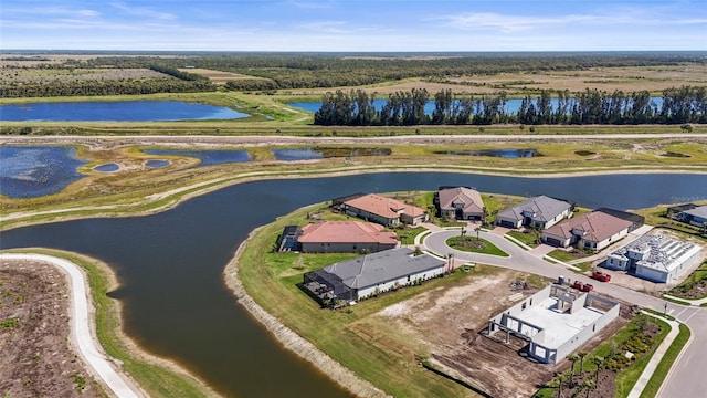 drone / aerial view featuring a water view