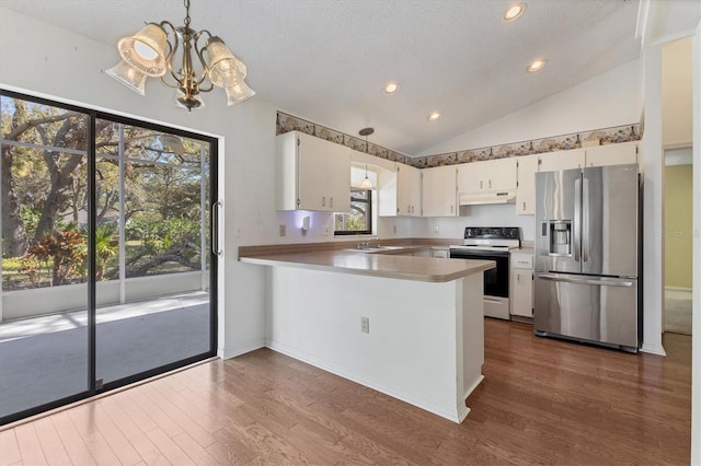 kitchen featuring stainless steel refrigerator with ice dispenser, under cabinet range hood, a sink, white electric stove, and vaulted ceiling