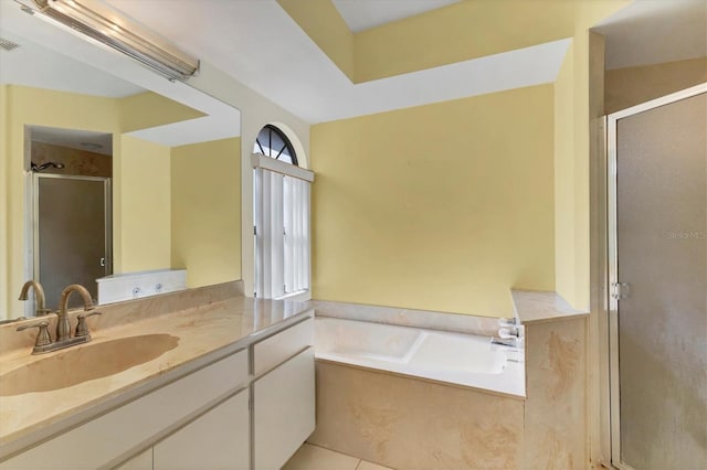 full bath featuring visible vents, a shower stall, tile patterned flooring, a bath, and vanity