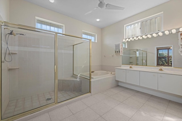 full bath with a bath, tile patterned floors, a healthy amount of sunlight, and a stall shower