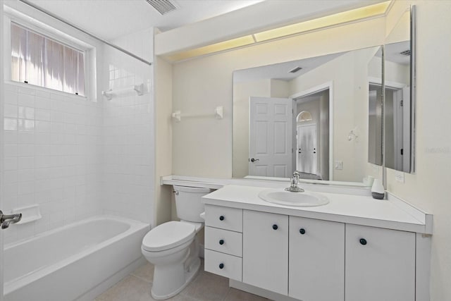 full bath featuring tile patterned floors, visible vents, toilet, bathtub / shower combination, and vanity