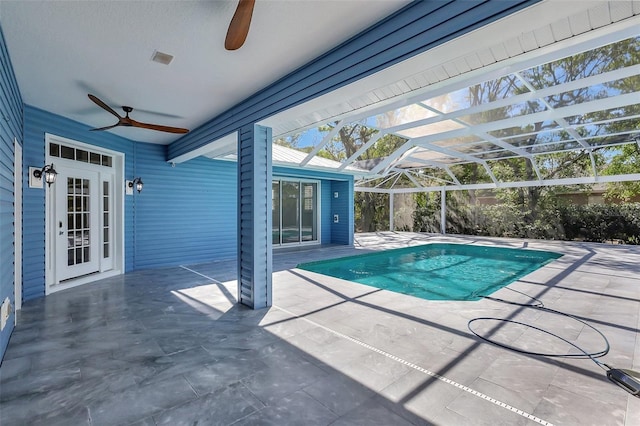 pool with a patio, a lanai, and ceiling fan