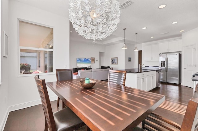 dining area with recessed lighting, visible vents, baseboards, and dark wood finished floors