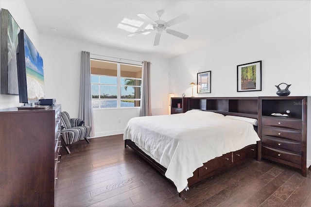 bedroom with wood-type flooring and ceiling fan