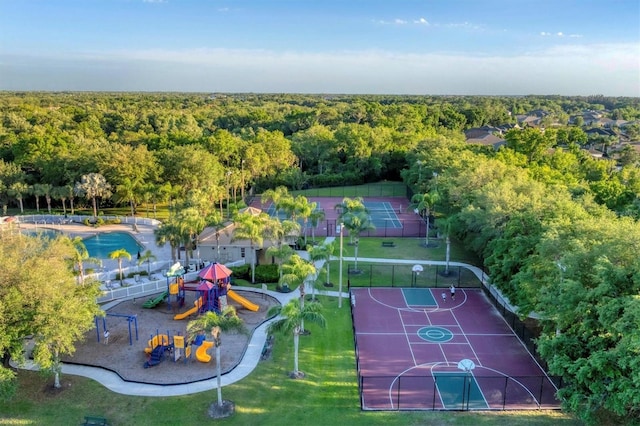 aerial view featuring a wooded view