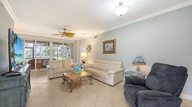 living area with light tile patterned floors, visible vents, a ceiling fan, and crown molding