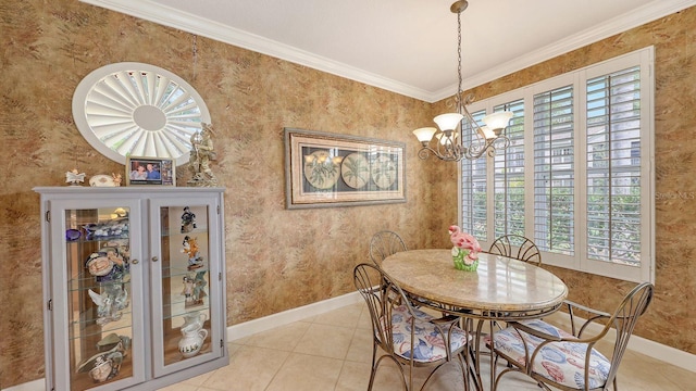 dining space featuring light tile patterned floors, baseboards, a chandelier, and ornamental molding