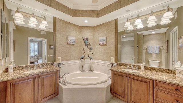 ensuite bathroom with a bath, wallpapered walls, ensuite bath, and a sink