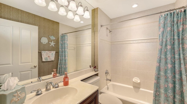 bathroom featuring vanity, toilet, and shower / bathtub combination with curtain