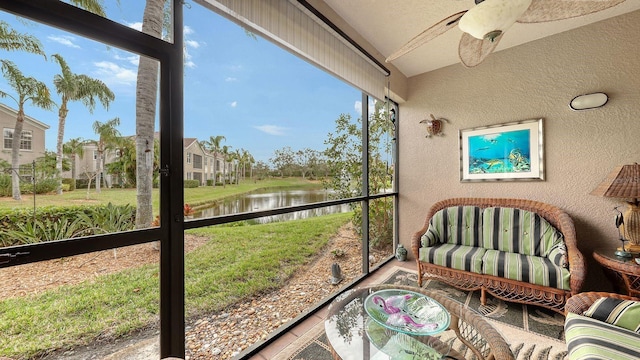 sunroom with a water view