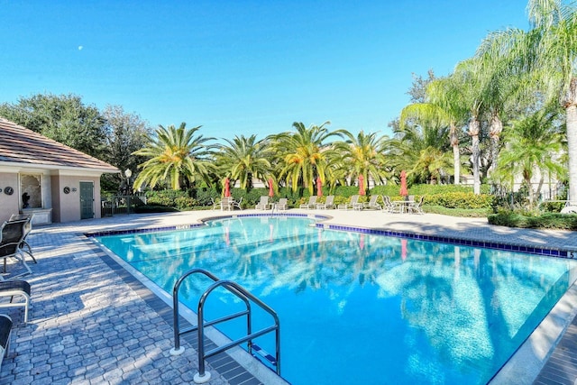 community pool featuring a patio area