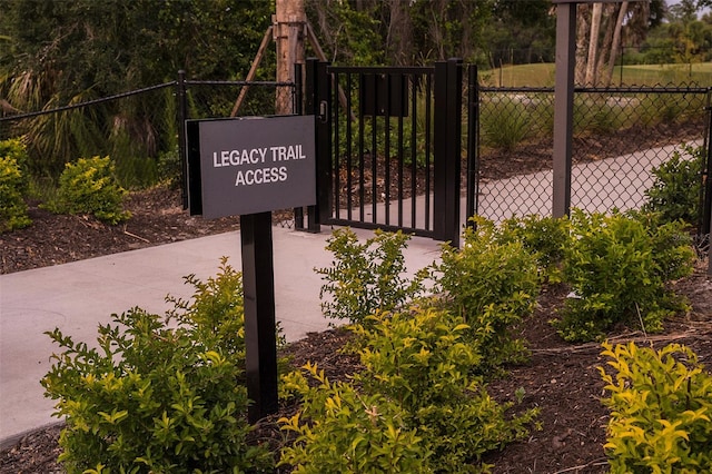 exterior details featuring a gate and fence