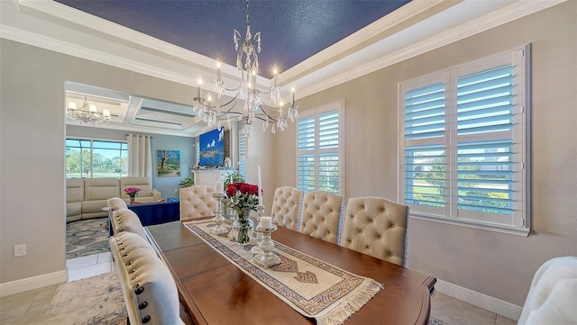 dining space featuring ornamental molding, coffered ceiling, an inviting chandelier, tile patterned flooring, and baseboards