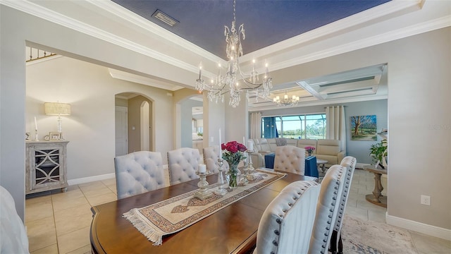 dining space with light tile patterned floors, an inviting chandelier, and crown molding