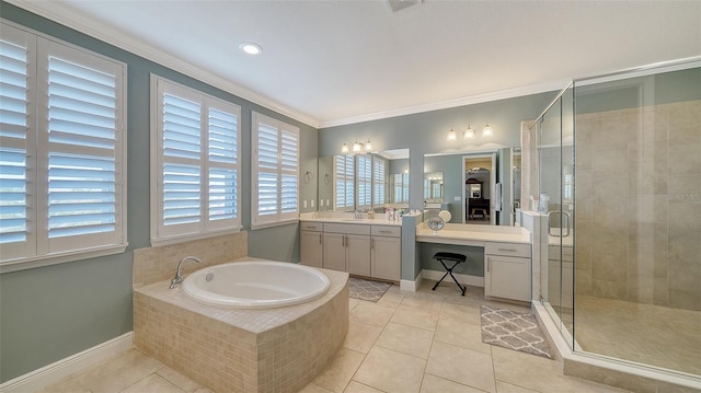 bathroom featuring a garden tub, ornamental molding, a stall shower, tile patterned floors, and vanity