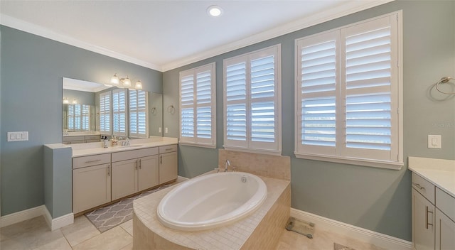 bathroom featuring a garden tub, ornamental molding, tile patterned flooring, baseboards, and vanity