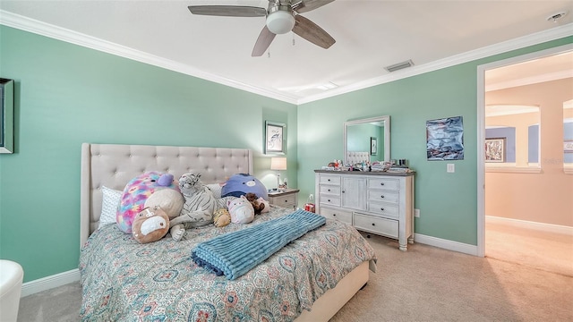 bedroom featuring crown molding, carpet flooring, baseboards, and visible vents